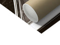 A toilet roll is upside down in brown paper  and a white towel with many roll