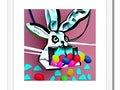 Art print closeup of a bunny eating a piece of bubble gum.