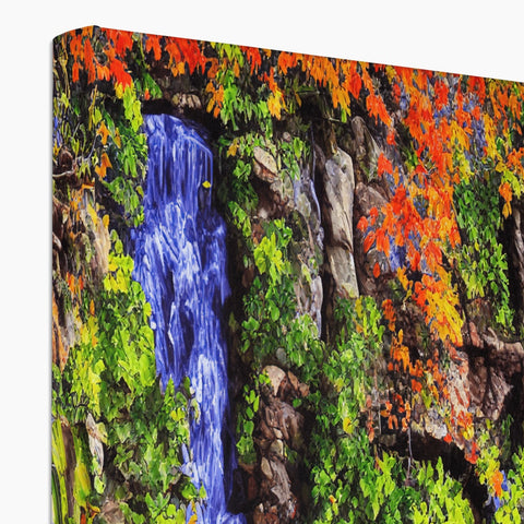 A wall mounted art print with a waterfall and rocks.