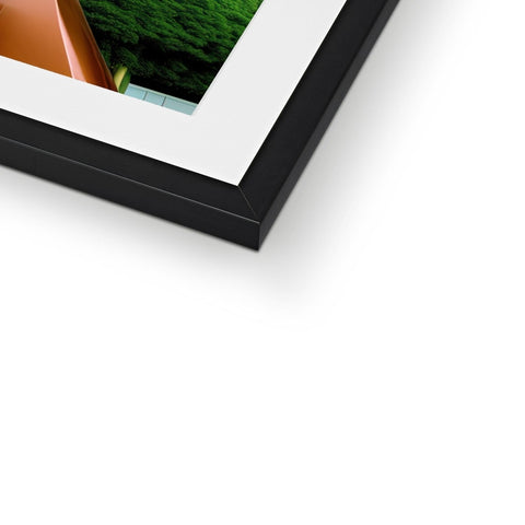 A photo of a picture frame sitting on a table is close up in a frame.