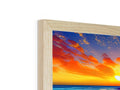A picture frame with a wood frame of a picture of a child in a beach with