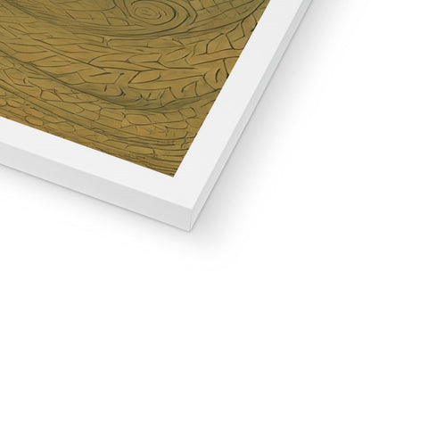 White panel of wood inside a photo frame, sitting on a table with green paper