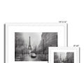 Art prints on a white backdrop in a picture of city streets.