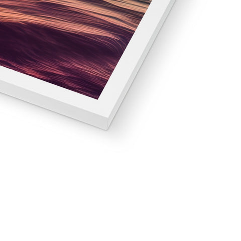 An  iPad is sitting on top of a table covered in white background.