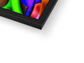 A very colorful picture frame displayed on a screen on a white tabletop and metal wall