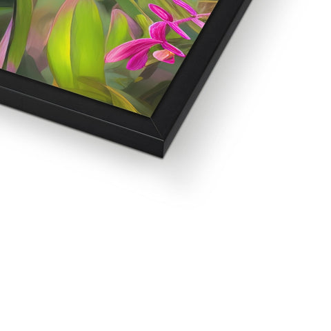 A photograph of a picture frame on top of a computer monitor.