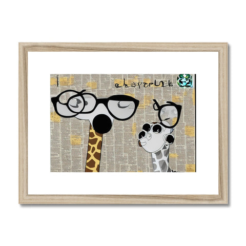 Two giraffe standing next to each other looking at a wooden frame