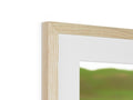 A picture of a person next to a mirror inside of a wood framed photo frame