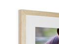 A picture frame with a photo of a horse on the side of it.