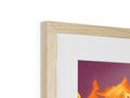 A wooden photo frame that holds a picture of a fireplace  for an exhibit  by