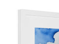 A framed photo of a blue and white picture on a white background.