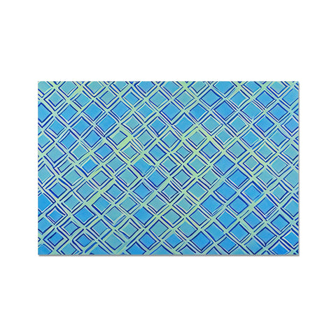 A blue cloth with a pattern and pattern on it laid in a table and tile.
