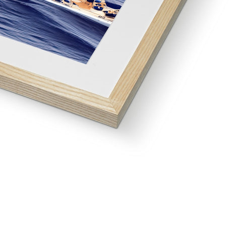 A picture of a sailboard in a wood picture frame.