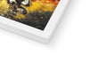 A photo on a small picture frame on top of a white poster of a large book