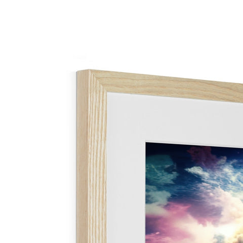 A white photo frame that has a frame wrapped in wood with a photograph inside.