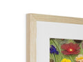 A picture frame with flowers and a picture on it is covered in wood.