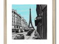 Picture printed on wood frame is a framed shot of a Paris with a city skyline in