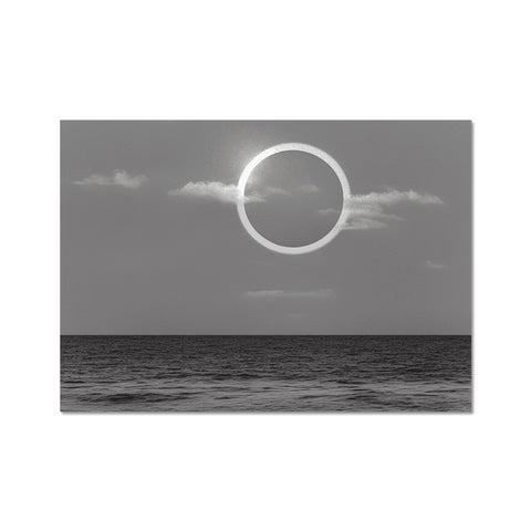 A picture of a black and white photo of a crescent moon on a canvas.