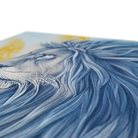 An art print on a blue table with a lion on it