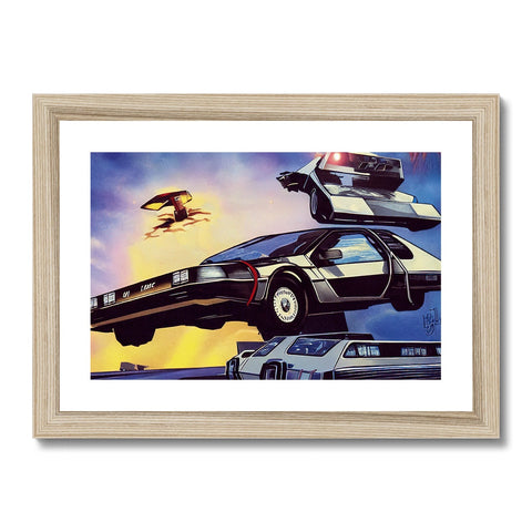 A white wooden framed picture of a vehicle on it's side in a white wall.