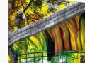 a 3D image of an overpass with graffiti covered trees in the background