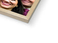 a picture frame with a white photo of people in a frame of wood sitting on an