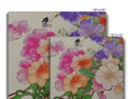 A wall tile set with flowers on it with white paper.