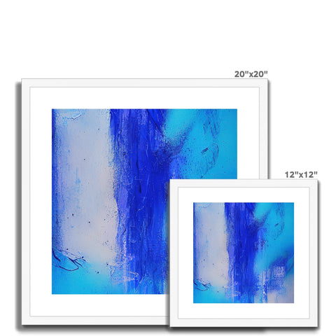 Two images sitting on an art print on a wall between two mirrors with blue water between