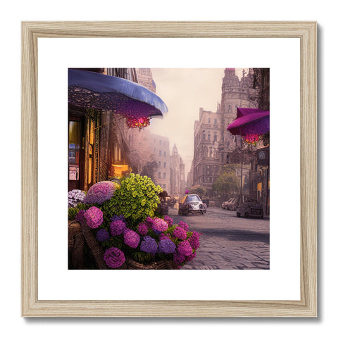 A photo hanging on a wooden frame of a city street with flowers in it.