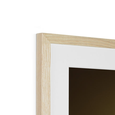 The frame on a photo frame hanging in a tall mirror is framed with wood.