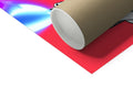 A white tp roller next to a roll of wrapping paper.