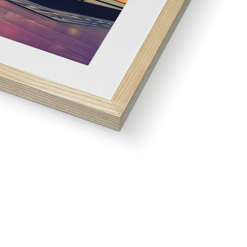 A photograph of a picture on a framed piece of wood is placed inside of a frame