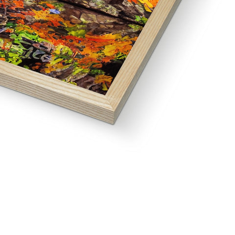 A photo book on a wooden frame with painted wood and paper on it.