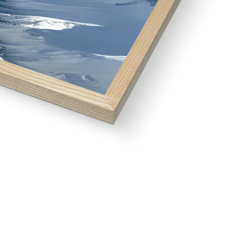 A wooden frame mounted on a white background is a photo in a mirror.