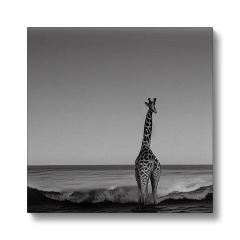 A giraffe is standing on a ledge by the ocean.