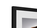A picture frame with a white background with an image of a person inside it.