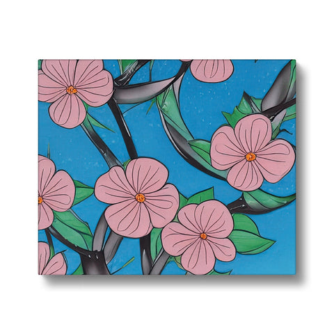 A blue background tile with pink flowers on it.