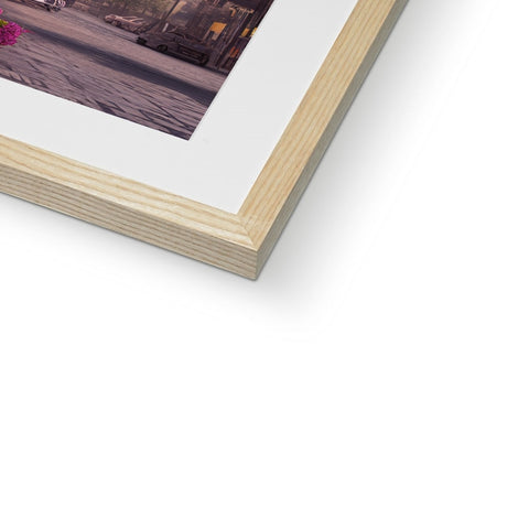 White wooden picture frame with wooden background on counter top of a wooden frame.