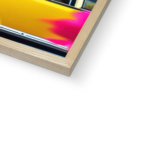 A colorful photograph inside of a large wooden frame on top of a table.