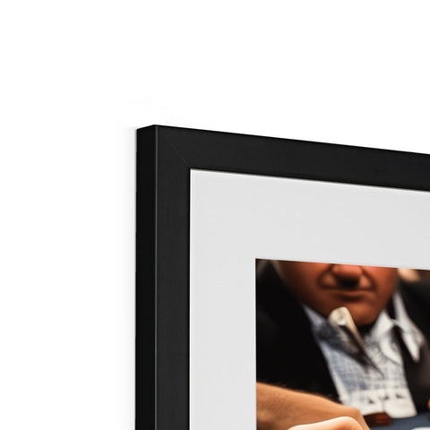 A flat panel photo with a picture frame that has a frame on edge by it.