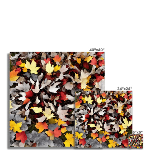 Fall foliage by a tile wall with a picture of autumn leaves.