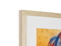 An art print is sitting on top of a wooden frame on a frame.