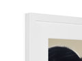 a picture frame with a picture hanging on a white picture frame on a wall