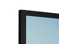 A wall mounted LCD television monitor that has two rows sitting and are different colors.