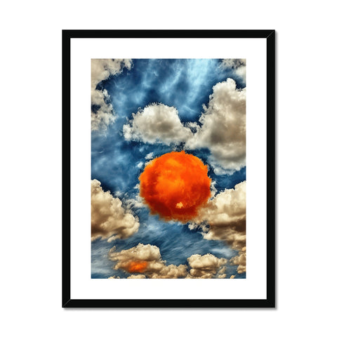 A blue and orange colorless sky on a framed picture with a balloon in it.