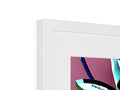 An imac picture frame frame with various colored artwork on top of it.
