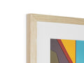 A wooden wooden picture frame that has various colors hanging on a wall.