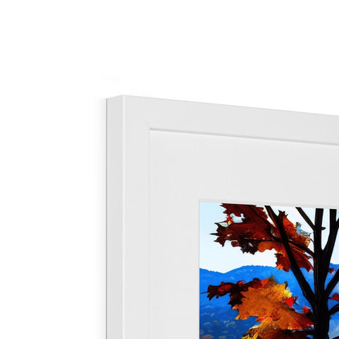 A picture frame is sitting on a wall with photos of a tree on it.