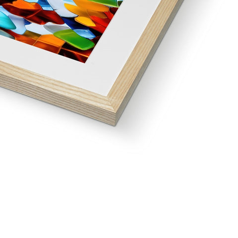 A picture frame with a photograph of some colorful shapes in it is shown.