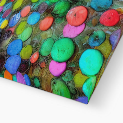 Cric tile on a large, square table with a rainbow colored piece in rainbow art